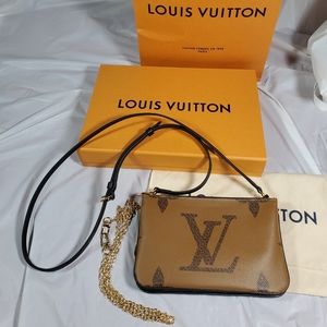 Authentic Louis Vuitton double zip pochette reversed monogra